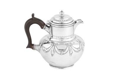 Lot 516 - A Victorian sterling silver hot water pot, Sheffield 1900 by James Dixon and Sons