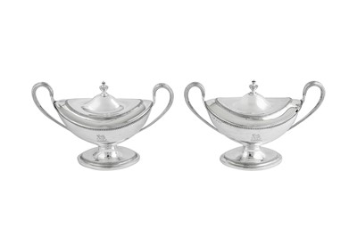 Lot 648 - A pair of George III Irish sterling silver sauce tureens, Dublin 1788 by Richard Williams