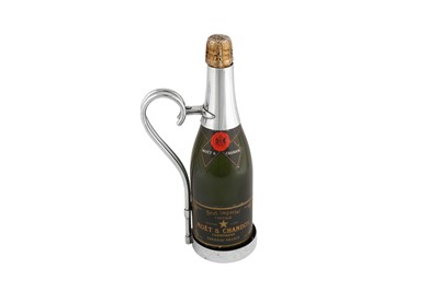 Lot 529 - An early 20th century American Art Deco silver wine bottle holder, circa 1920 by Cartier