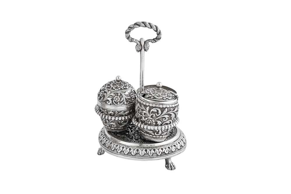 Lot 138 - An early 20th century Anglo – Indian silver cruet, Cutch, Bhuj circa 1900 by Oomersi Mawji jnr (active 1890-1930)
