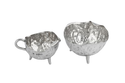 Lot 245 - A Victorian ‘Arts and Crafts’ sterling silver strawberry set, London 1883 by Hukin and Heath, the design attributed to Dr Christopher Dresser (1834-1904)