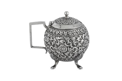 Lot 131 - An early 20th century Anglo – Indian unmarked silver mustard pot, Cutch circa 1910