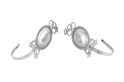 Lot 192 - A pair of 18th century Dutch East Indies silver curtain ties, Batavian