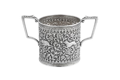 Lot 141 - A rare documentary late 19th century Anglo – Indian silver three-piece tea service, Cutch, Bhuj circa 1880 by Oomersi Mawji (active 1860-90)