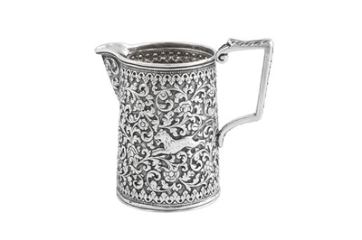 Lot 141 - A rare documentary late 19th century Anglo – Indian silver three-piece tea service, Cutch, Bhuj circa 1880 by Oomersi Mawji (active 1860-90)