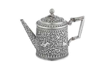 Lot 141 - A rare documentary late 19th century Anglo – Indian silver three-piece tea service, Cutch, Bhuj circa 1880 by Oomersi Mawji (active 1860-90)