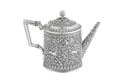 Lot 141 - A rare documentary late 19th century Anglo – Indian silver three-piece tea service, Cutch, Bhuj circa 1880 by Oomersi Mawji (active 1860-90)