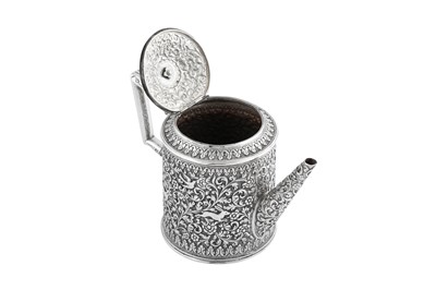 Lot 141 - A rare documentary late 19th century Anglo – Indian silver three-piece tea service, Cutch, Bhuj circa 1880 by Oomersi Mawji (active 1860-90)
