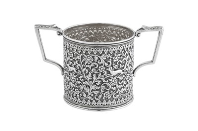 Lot 141 - A rare documentary late 19th century Anglo – Indian silver three-piece tea service, Cutch, Bhuj circa 1880 by Oomersi Mawji (active 1860-90)