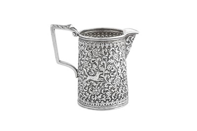 Lot 141 - A rare documentary late 19th century Anglo – Indian silver three-piece tea service, Cutch, Bhuj circa 1880 by Oomersi Mawji (active 1860-90)