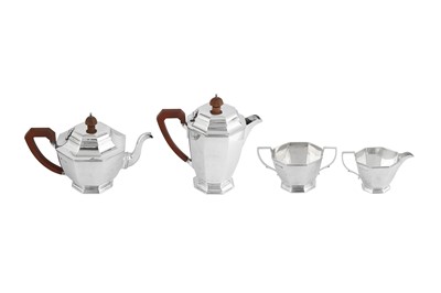 Lot 463 - An Edward VIII sterling silver three-piece sterling silver tea service, Birmingham 1936 by Harrods