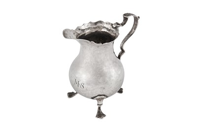 Lot 7 - A GEORGE III STERLING SILVER MILK OR CREAM JUG, LONDON 1766 BY STEPHEN ADAMS