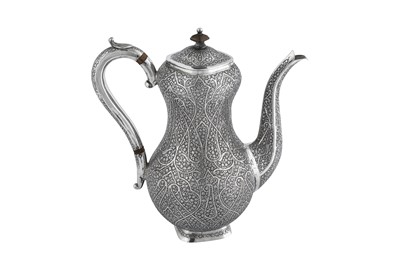 Lot 103 - A late 19th / early 20th century Anglo – Indian unmarked silver coffee pot, Kashmir circa 1900