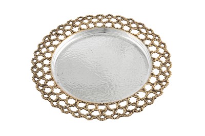 Lot 445 - An Elizabeth II modernist parcel gilt sterling silver dish or plate, London 1976 by Stuart Devlin