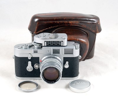 Lot 166 - Single Wind Leica M3 Rangefinder Body with 5cm Summicron Lens.