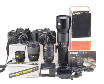 Lot 518 - A Collection of Konica Cameras & Lenses.