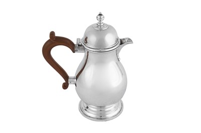 Lot 461 - A George VI sterling silver hot water or hot milk pot, London 1938 by WEB (untraced)