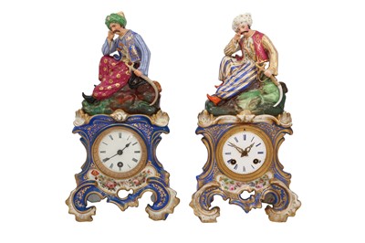 Lot 687 - TWO ORIENTALIST PORCELAIN MANTEL CLOCKS WITH RESTING TURKS