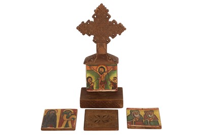 Lot 386 - A POLYCHROME-PAINTED PORTABLE ETHIOPIAN COPTIC POLYPTYCH