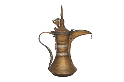 Lot 662 - A BAHRAINI QURAYSHIA BRASS COFFEE POT (DALLAH)