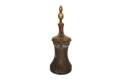 Lot 112 - A LARGE QURAYSHIA HASAWIA BRASS AND COPPER COFFEE POT (DALLAH)