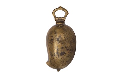 Lot 507 - A PORTABLE MANGO-SHAPED BRASS LIME PASTE CONTAINER