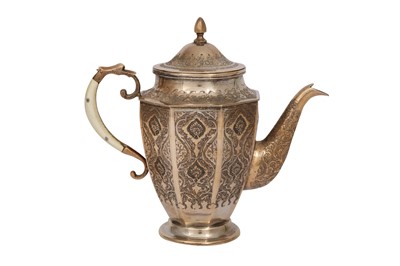 Lot 619 - AN IRANIAN ENGRAVED SILVER TEAPOT