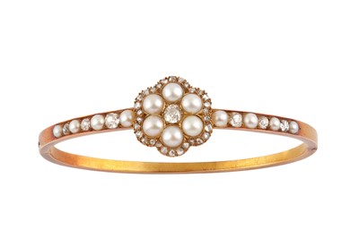 Lot 5 - A diamond and pearl bangle