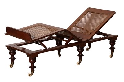Lot 137 - A 19TH CENTURY CANED MAHOGANY CAMPAIGN BED