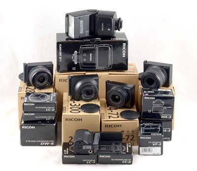 Lot 452 - Extensive 4-Lens Ricoh GXR Digital Camera Outfit.