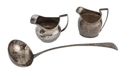 Lot 26 - TWO GEORGE III STERING SILVER MILK JUGS