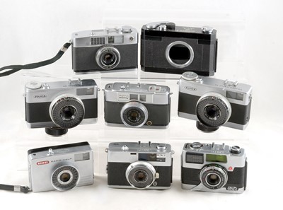 Lot 460 - A Good Group of 8 Half Frame Cameras.