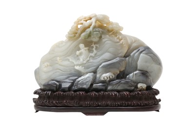 Lot 136 - A CHINESE PALE CELADON AND GREY JADE 'MOUNTAIN' CARVING.