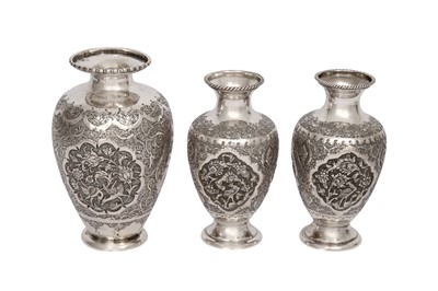 Lot 627 - THREE IRANIAN ENGRAVED SILVER MINIATURE POSY VASES