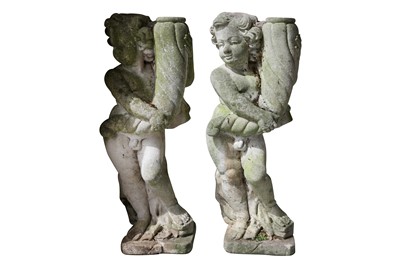 Lot 238 - A PAIR OF RECONSTITUTED STONE FIGURES OF CHERUBS