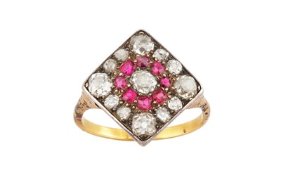 Lot 32 - A ruby and diamond cluster ring