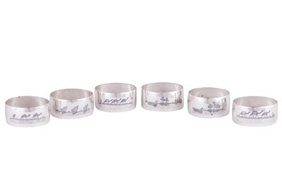Lot 669 - SIX IRAQI SILVER AND NIELLO NAPKIN RINGS WITH RIVER SCENES