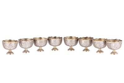Lot 705 - EIGHT OTTOMAN PARCEL-GILT ENGRAVED ZARF HOLDERS