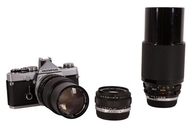 Lot 511 - A Olympus OM1n SLR Camera Outfit
