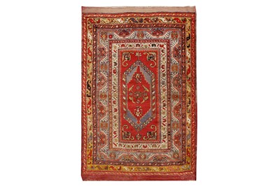 Lot 21 - A TURKISH RUG