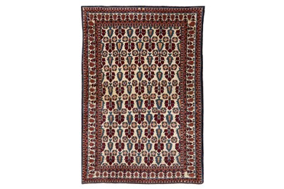 Lot 13 - AN UNUSUAL NORTH-EAST PERSIAN RUG