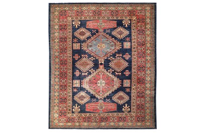 Lot 19 - A FINE UZBEKISTAN CARPET OF CAUCASIAN DESIGN