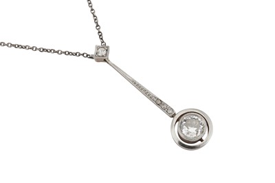 Lot 41 - A diamond pendant necklace and earring suite