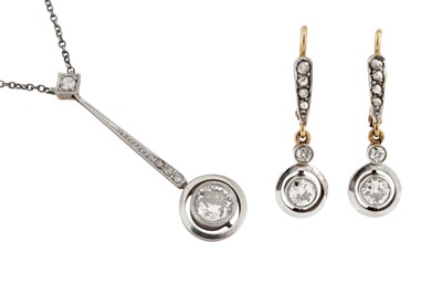Lot 41 - A diamond pendant necklace and earring suite