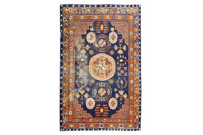 Lot 49 - AN ANTIQUE KHOTAN RUG, EAST TURKESTAN