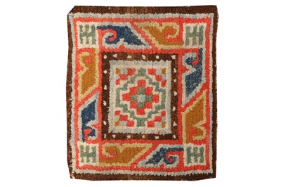 Lot 46 - AN ANTIQUE TIBETAN BAG FACE
