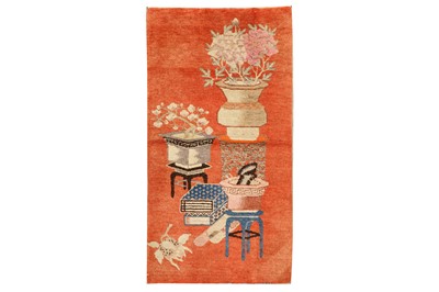 Lot 48 - AN ANTIQUE CHINESE RUG