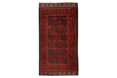 Lot 69 - AN ANTIQIUE BALOUCH RUG, NORTH-EAST PERSIA