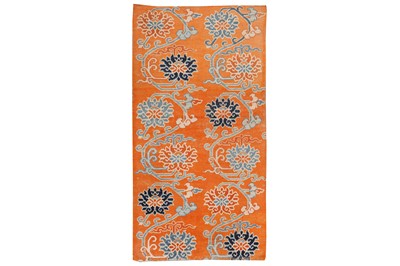 Lot 71 - AN ANTIQUE TIBETAN RUG