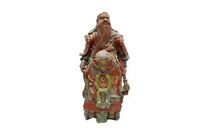 Lot 618 - A JAPANESE GLAZED POTTERY FIGURE OF SHŌKI